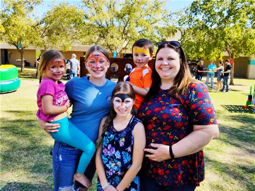 a family enjoys an event